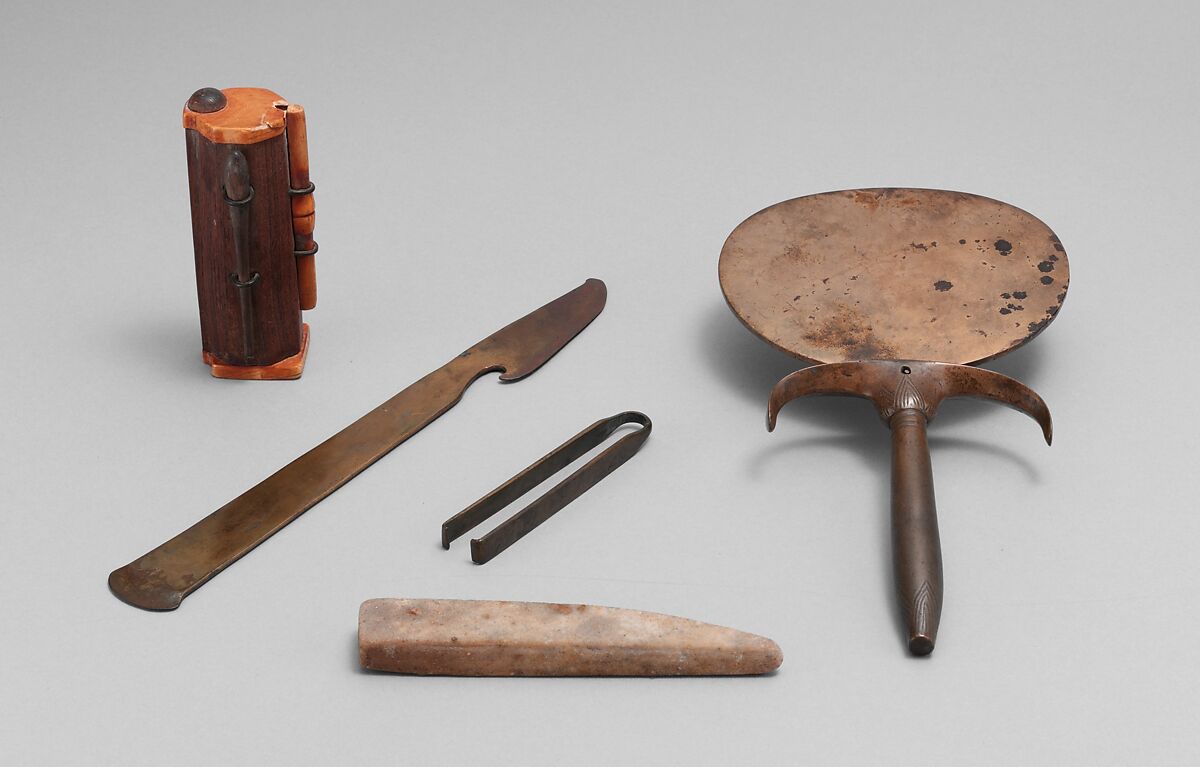 Cosmetic set of Kohl Tube and Applicator, Razor, Tweezers, Whetstone, and Mirror, Bronze or copper alloy, stone, ivory, wood