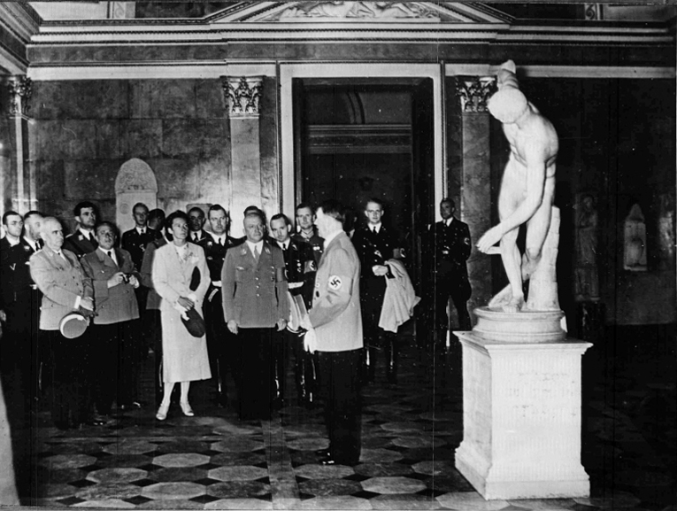 Adolf Hitler presents Myron's Discobolus, which he just purchased, in Munich's Glyptothek